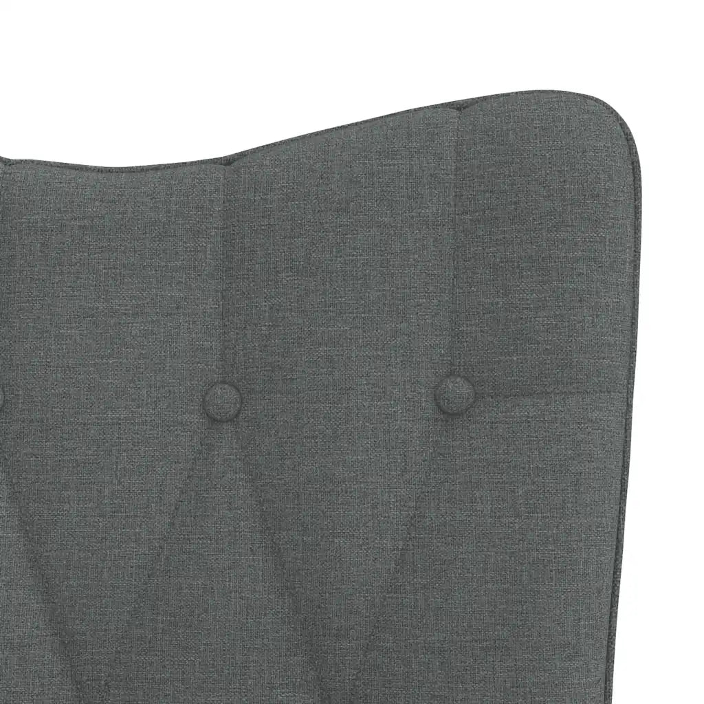 Un Fauteuil à Bascule gris, avec un dossier haut confortable.