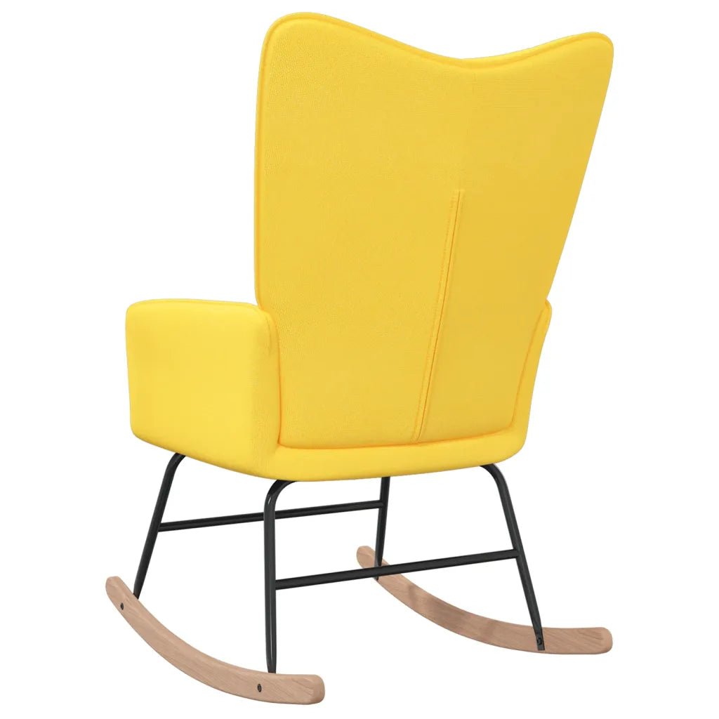 Une Chaise à Bascule au design Scandinave grâce à sa couleur jaune moutarde.