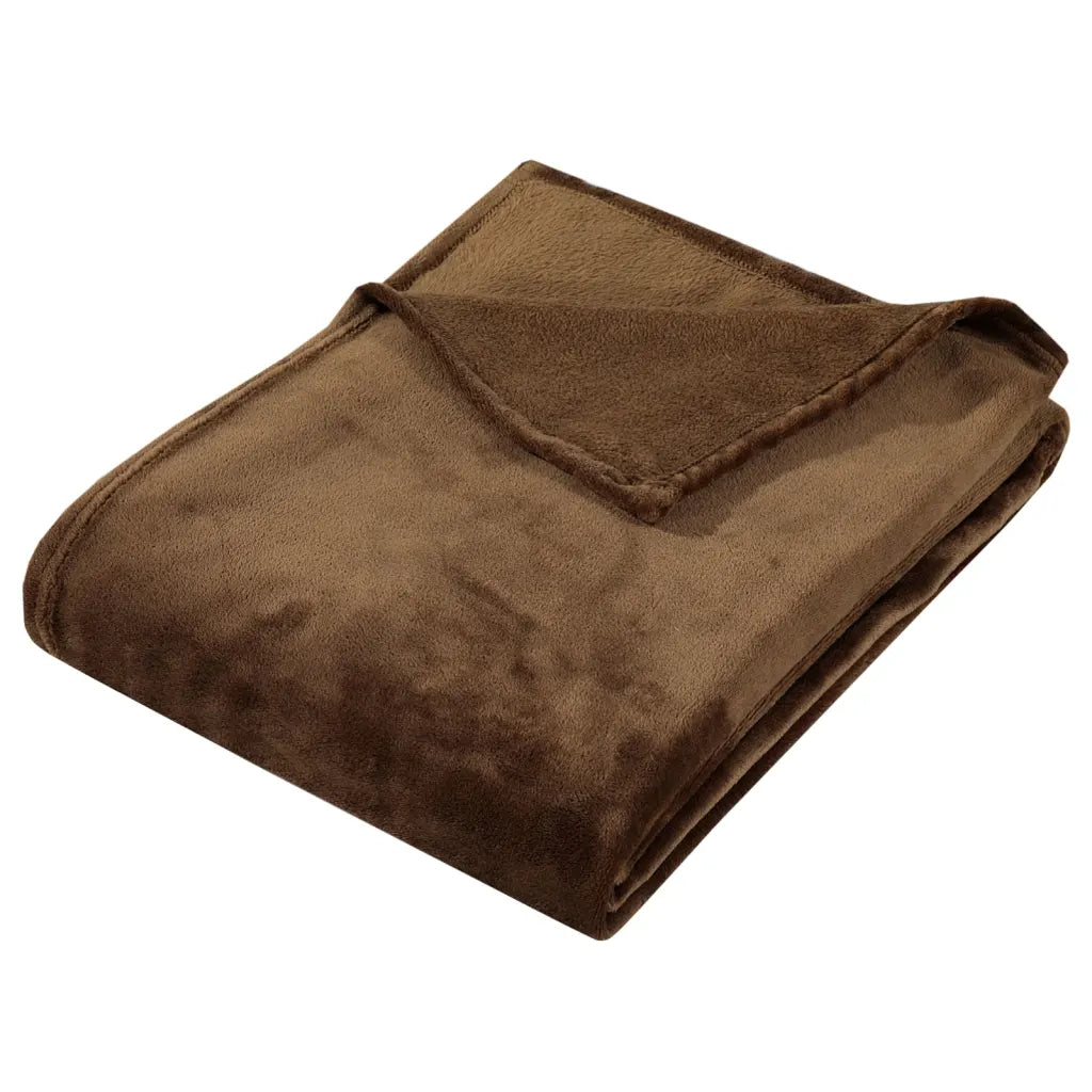 une Couverture Marron ultra douce disponible en plusieurs coloris, parfaite pour accompagner votre moment de détente dans un Rocking Chair.