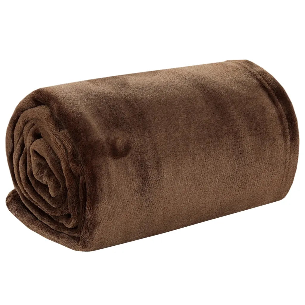 une Couverture Marron ultra douce disponible en plusieurs coloris, parfaite pour accompagner votre moment de détente dans un Rocking Chair.