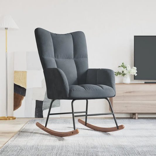 Un Fauteuil à Bascule Matelassé de couleur gris foncé.