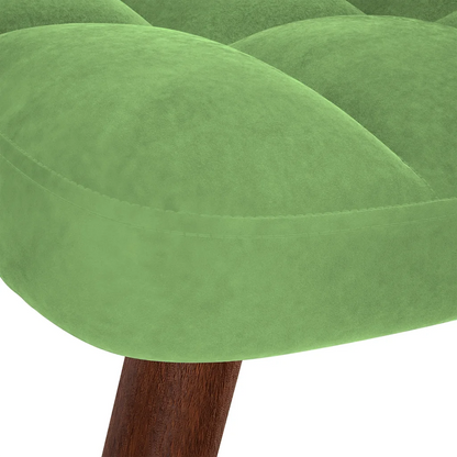 Un Fauteuil à Bascule en velours de couleurs vert clair ou Vert d'Eau