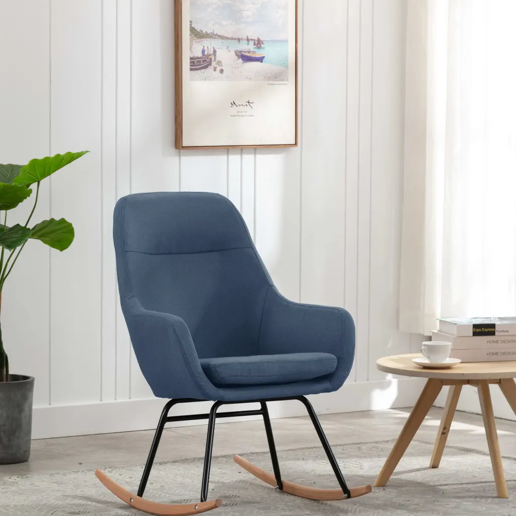 Un petit Fauteuil Idéal pour l'Allaitement, recouvert avec du tissu de couleur bleu.