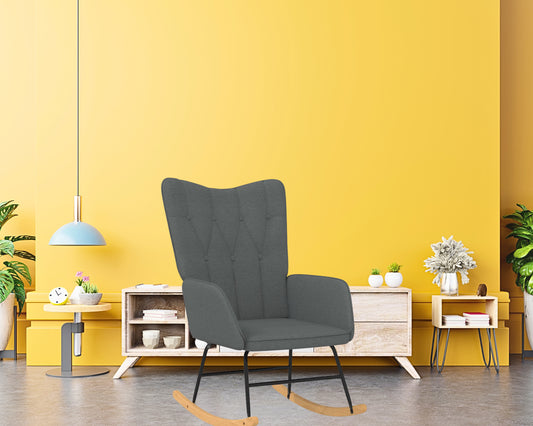 Un Fauteuil à Bascule gris, avec un dossier haut confortable.